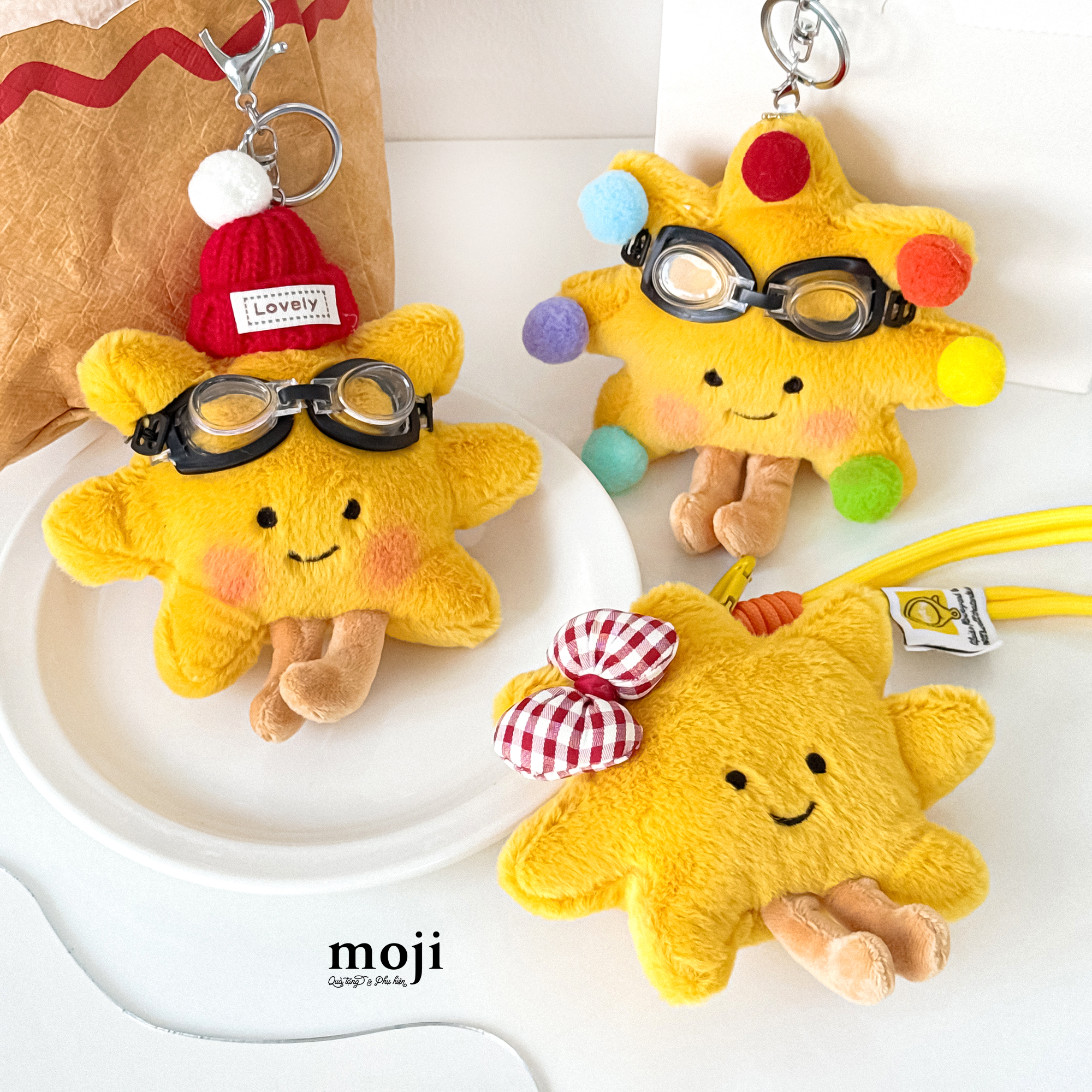 Móc khóa nhồi bông Sun mặt trời có chân đeo kính đội mũ đính nơ
