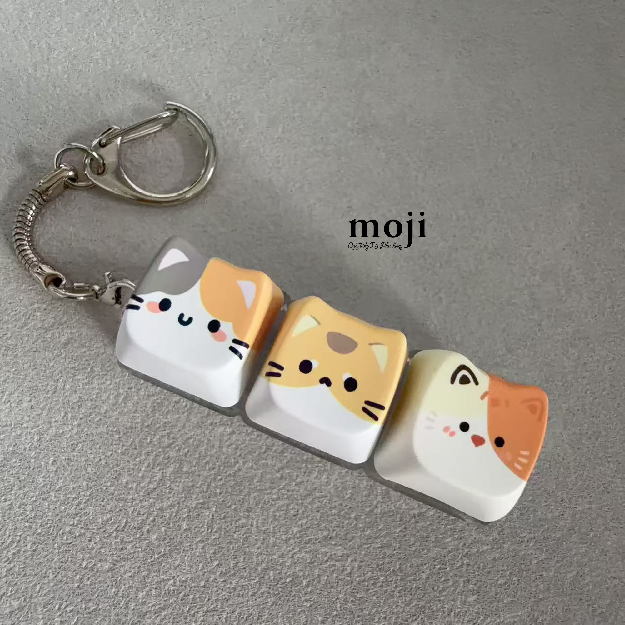B.05G Móc khóa ANM-26080179 - X 2 ghép 2 màu.jpg