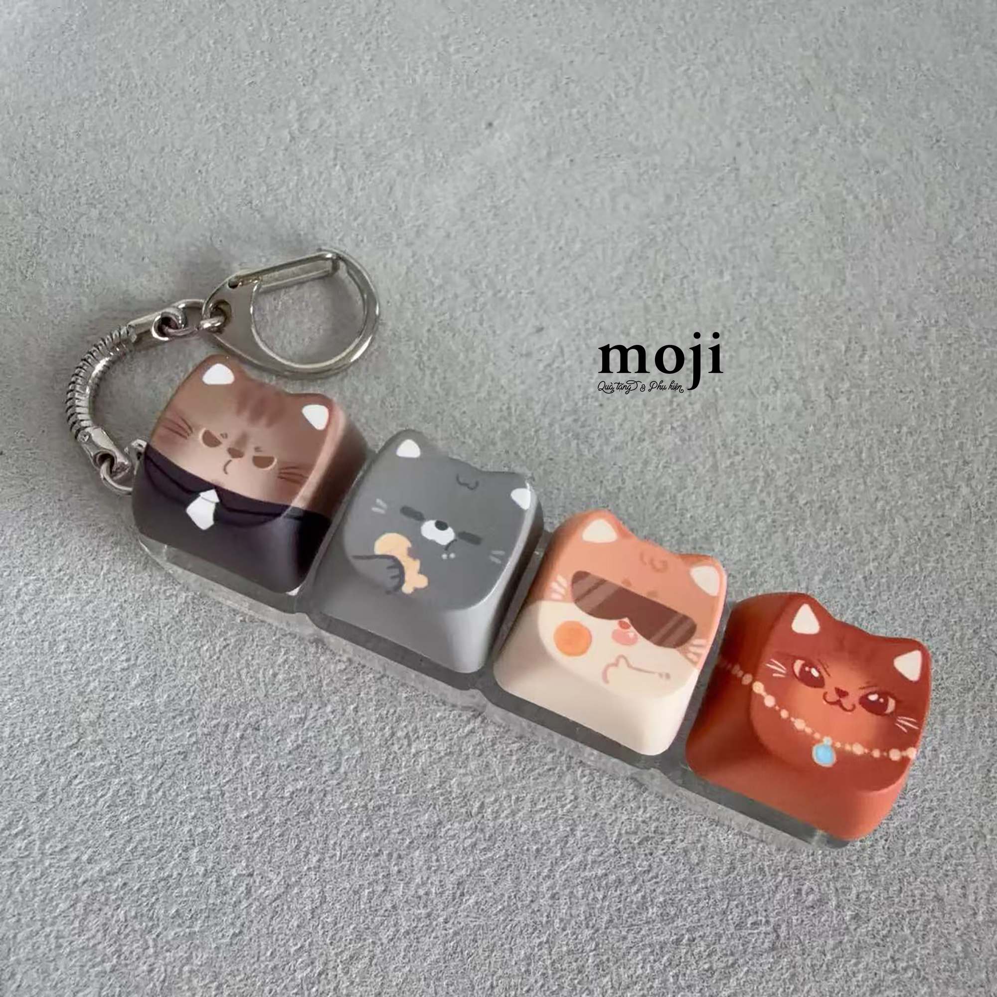 B.05G Móc khóa ANM-26080180 - BR ghép ảnh 4 màu .jpg