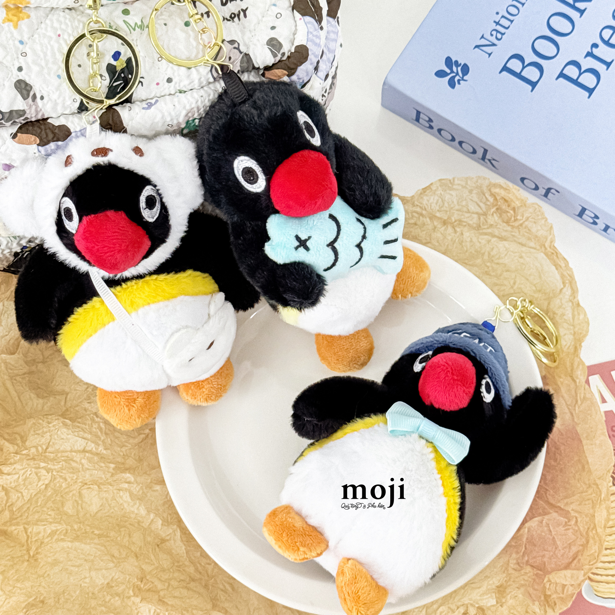 Moc-khoa-nhoi-bong-Penguin-chim-canh-cut-doi-mu-deo-tui-om-ca-2.JPG