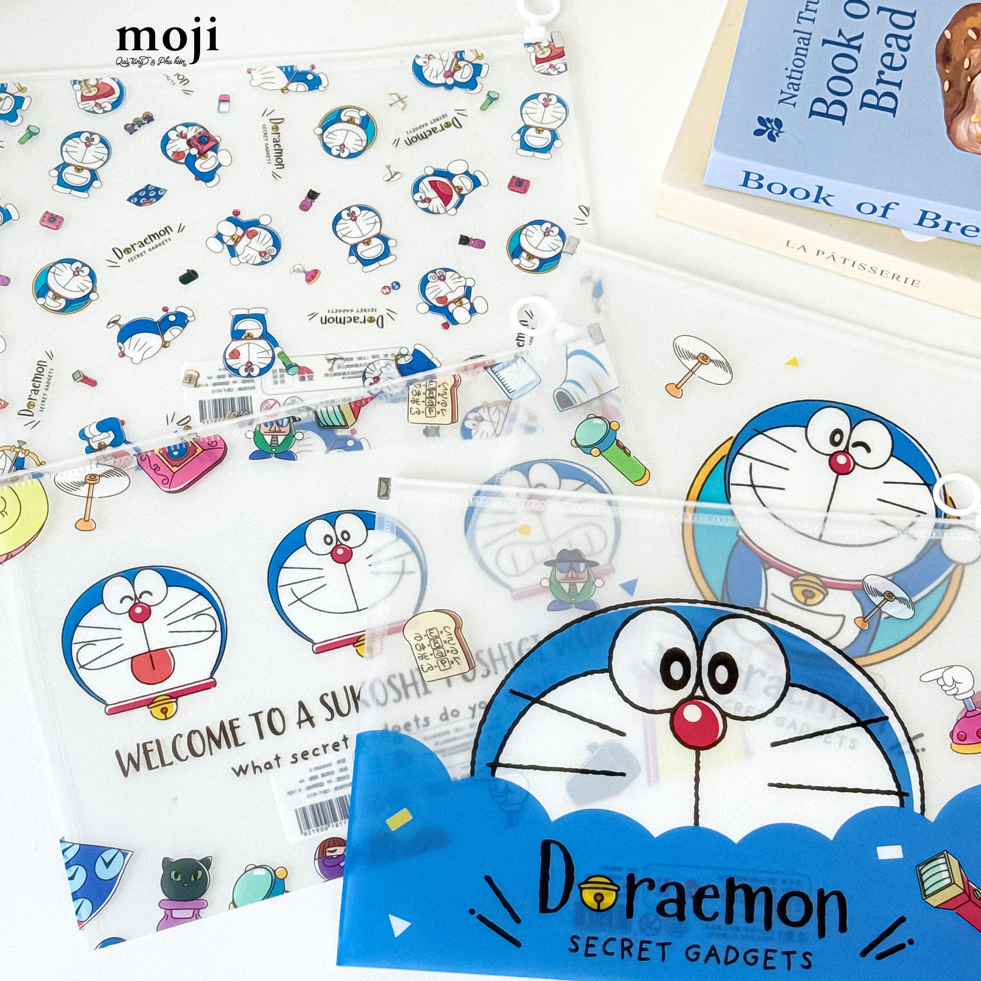 Tui-dung-tai-lieu-MJ-khoa-keo-Doraemon-Doremon-secret-gadgets-25x32_25074166.JPG