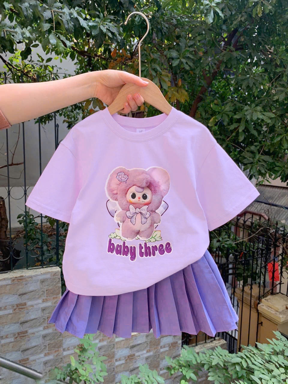 Bộ babythree áo tím chân váy xếp li tím bé gái