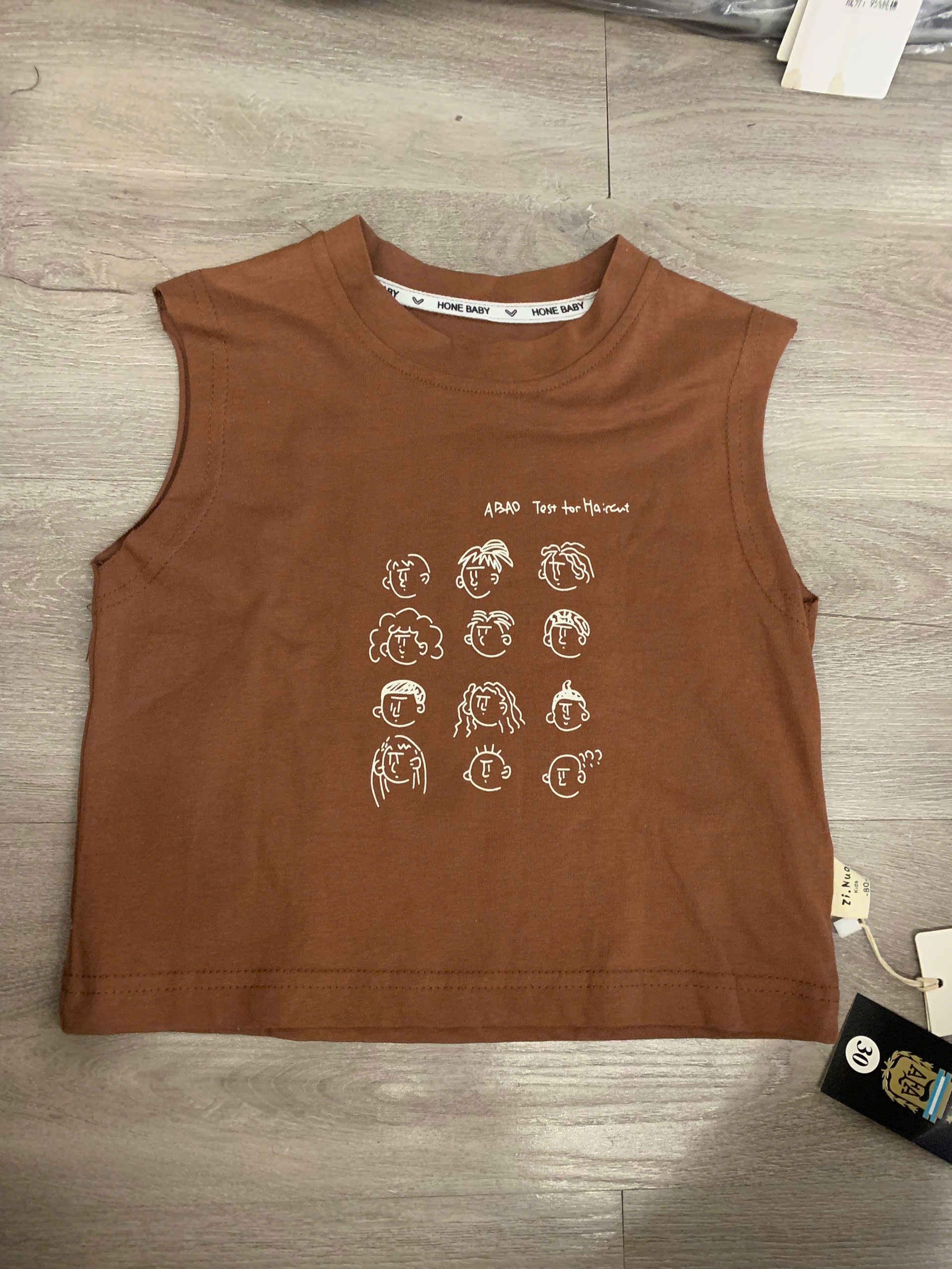 Áo 3 lỗ nâu hình