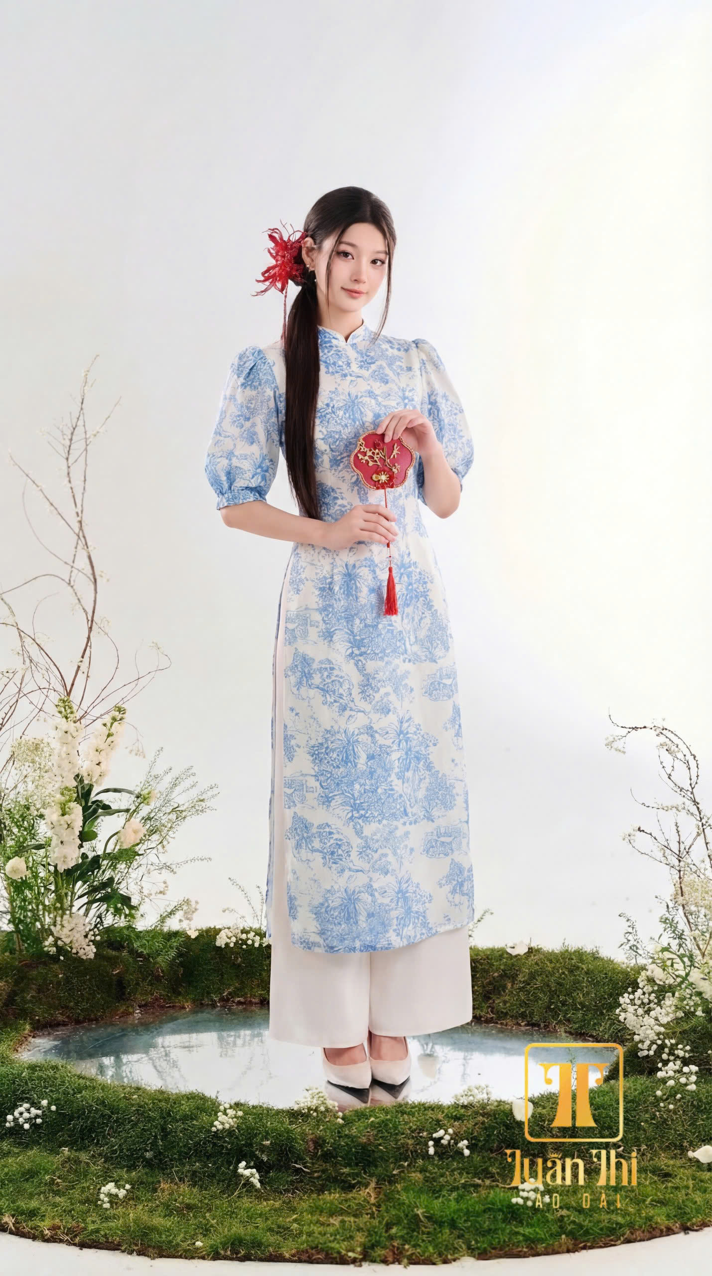 ADCT Tơ trắng 4 tà hoa xanh phồng vai
