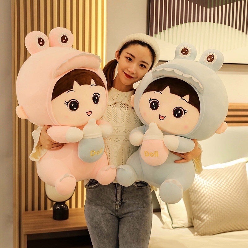 Gấu bông doll khủng long ôm bình sữa cao 50cm( xanh,hồng)