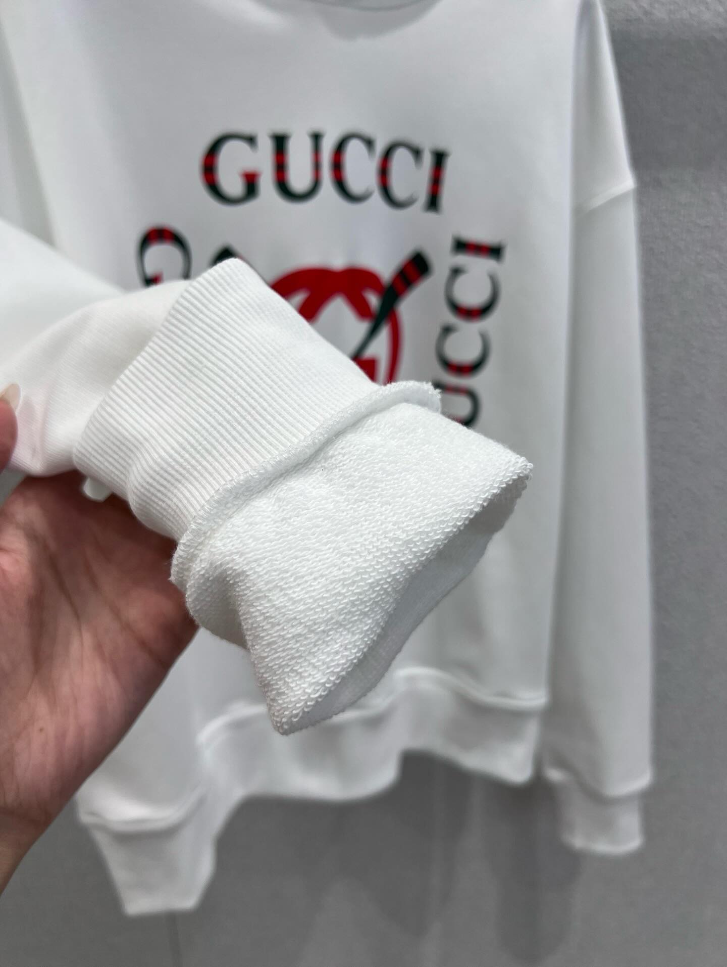 Áo Hoddie GG kid trắng logo chữ xanh 771624