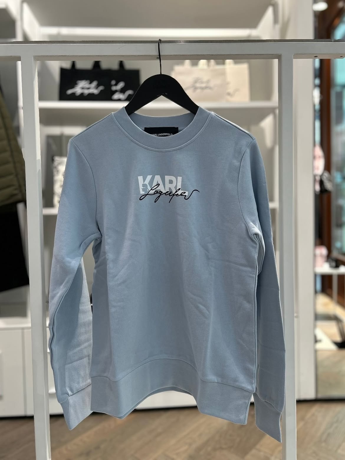 Áo nỉ Karl xanh logo trắng phối đen - BSW20007