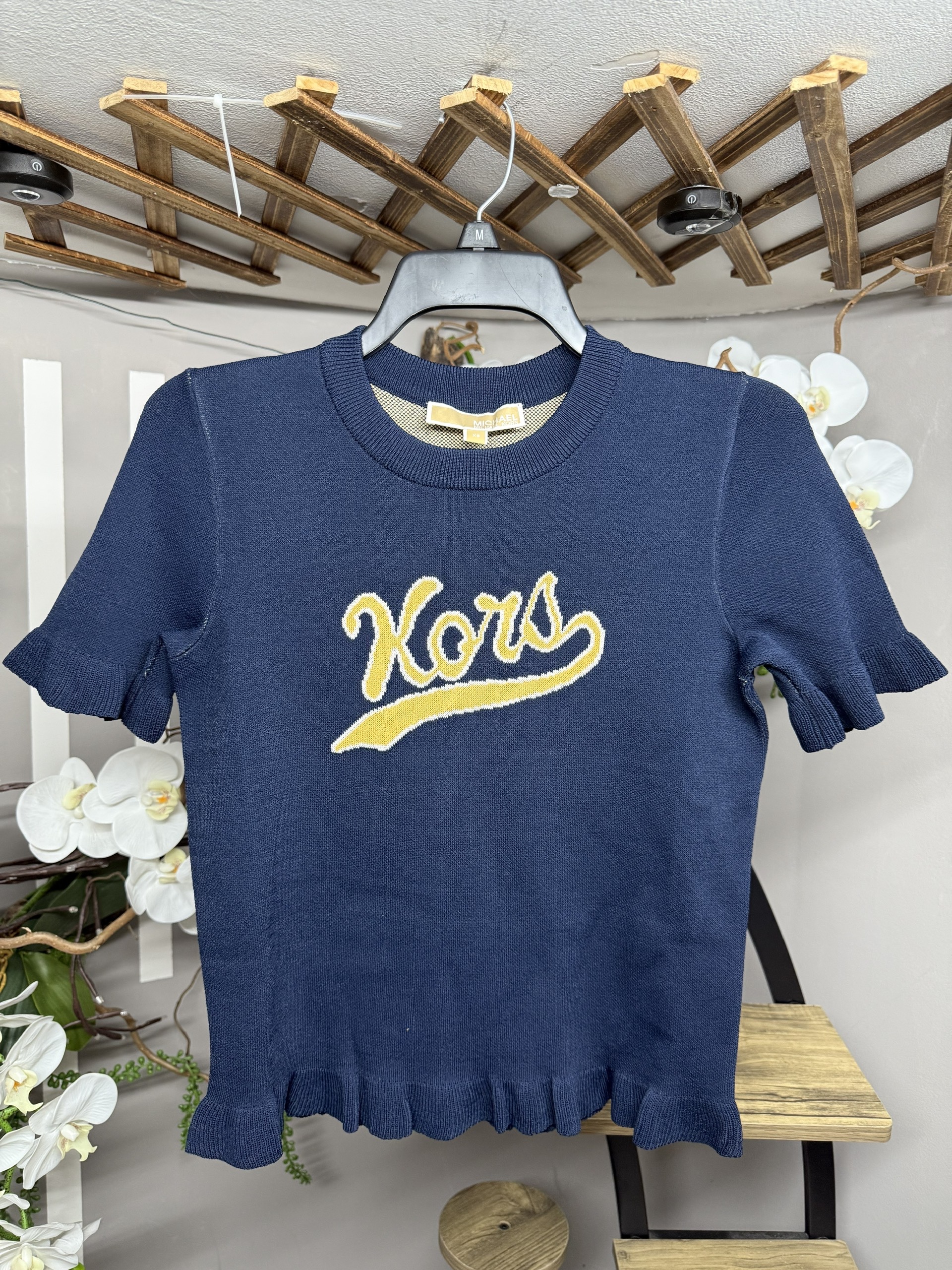 Áo nỉ MK màu xanh navy logo vàng JT661J15ZV