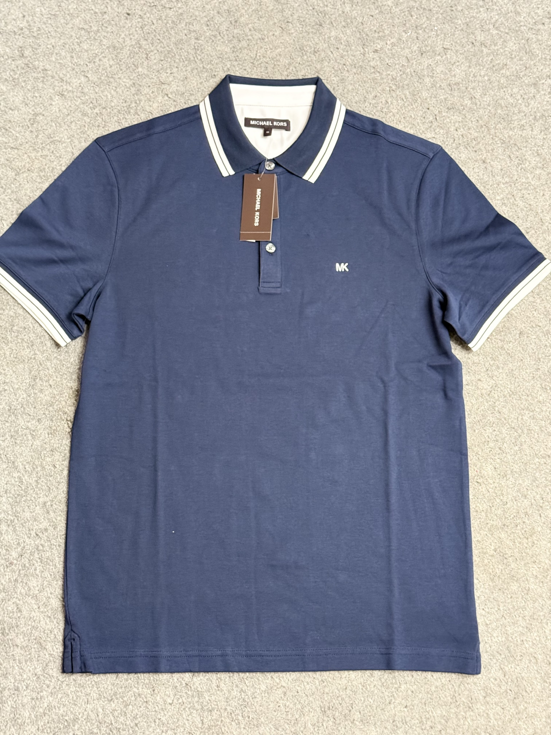 Áo polo nam MK navy trơn viền trắng