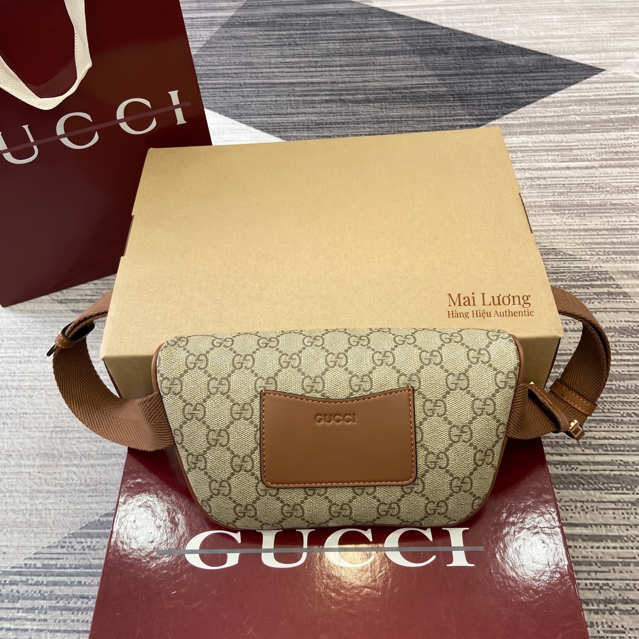 Belt bag GG nâu full logo viền da 821165