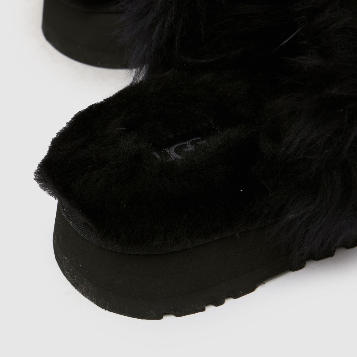 Sục UGG - Disquette chalet viền lông đen