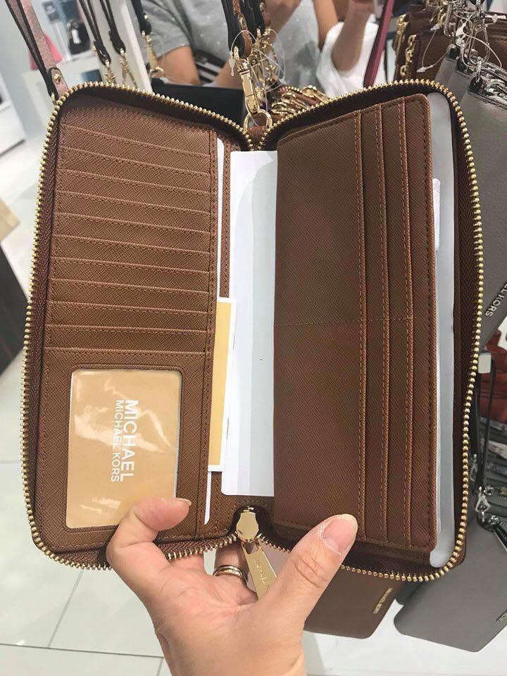Ví dài MK khóa zip nhiều ngăn màu nâu họa tiết monogram - KT: 21x10x3.5 35F8GTVT3B