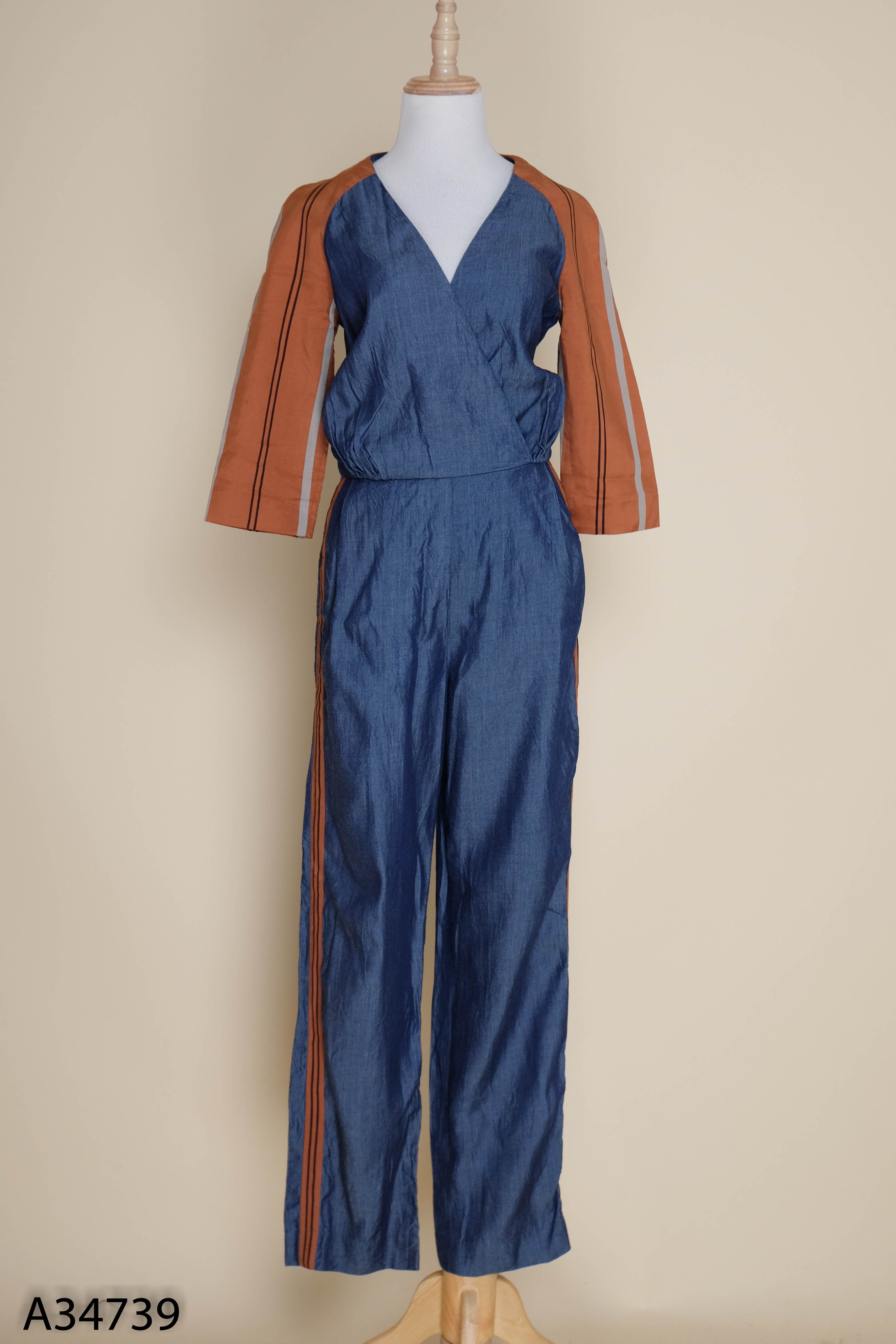 Jumpsuits jeans xanh mỏng viền nâu
