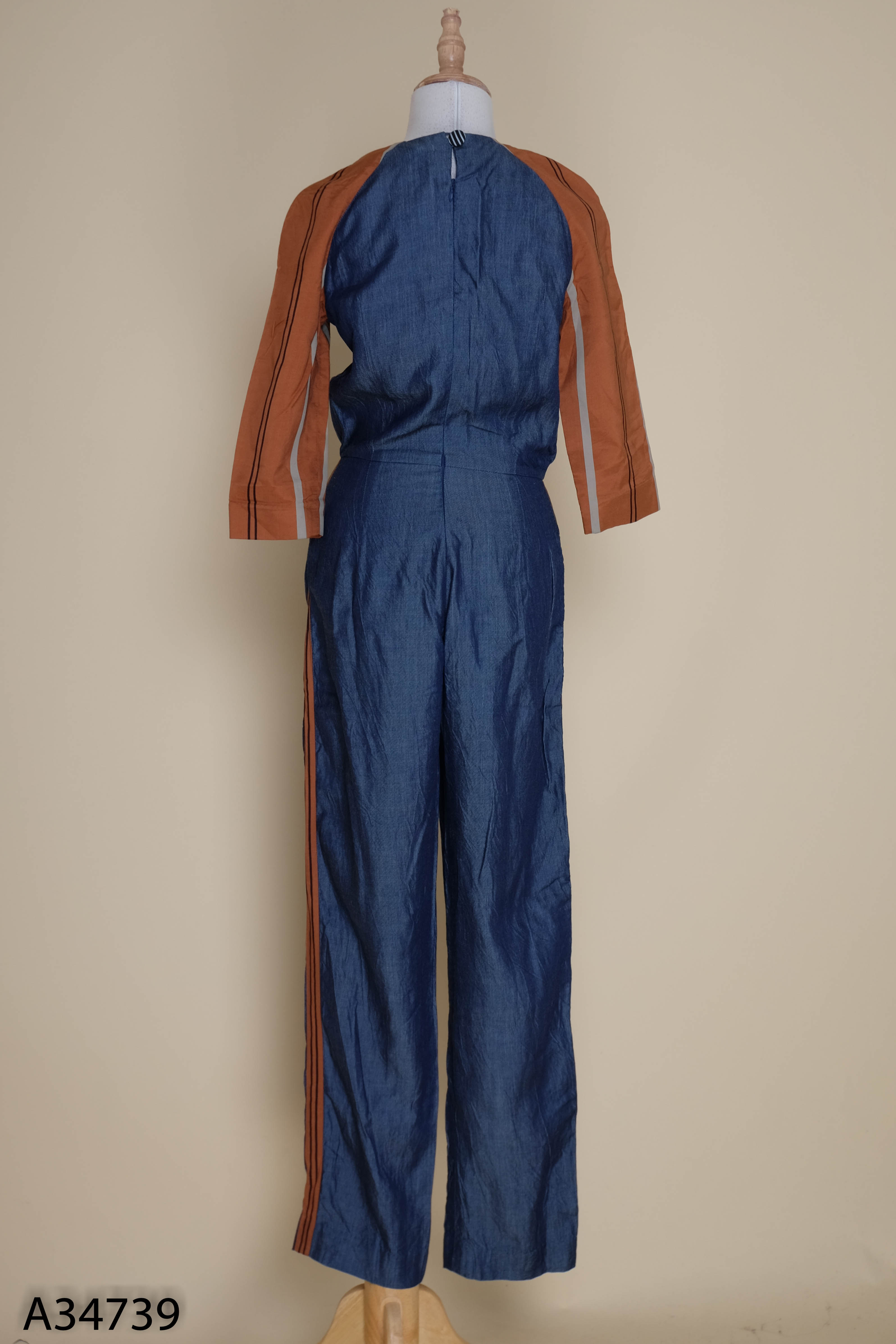 Jumpsuits jeans xanh mỏng viền nâu