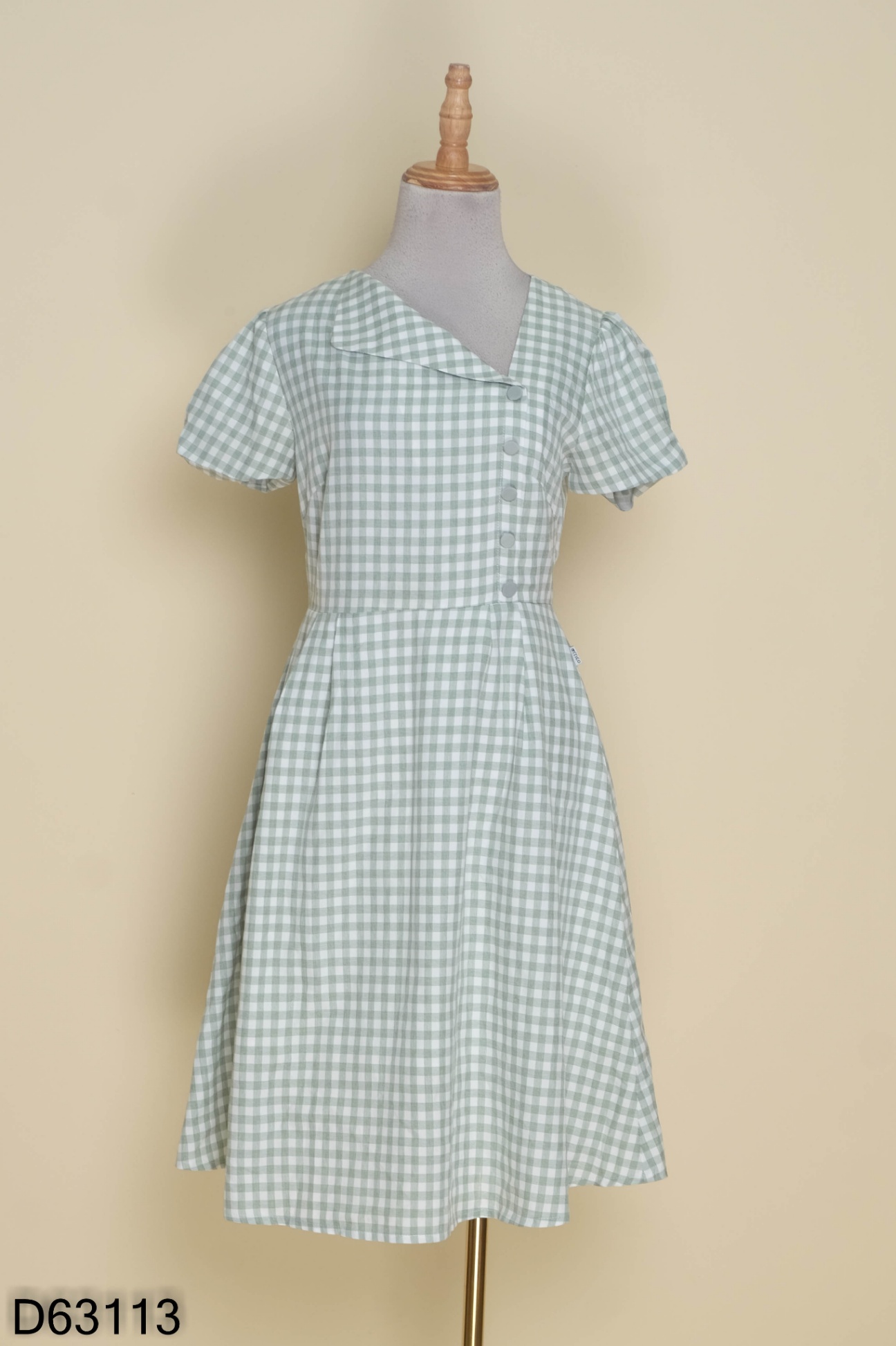 Váy xanh kẻ caro MÉO phối cúc