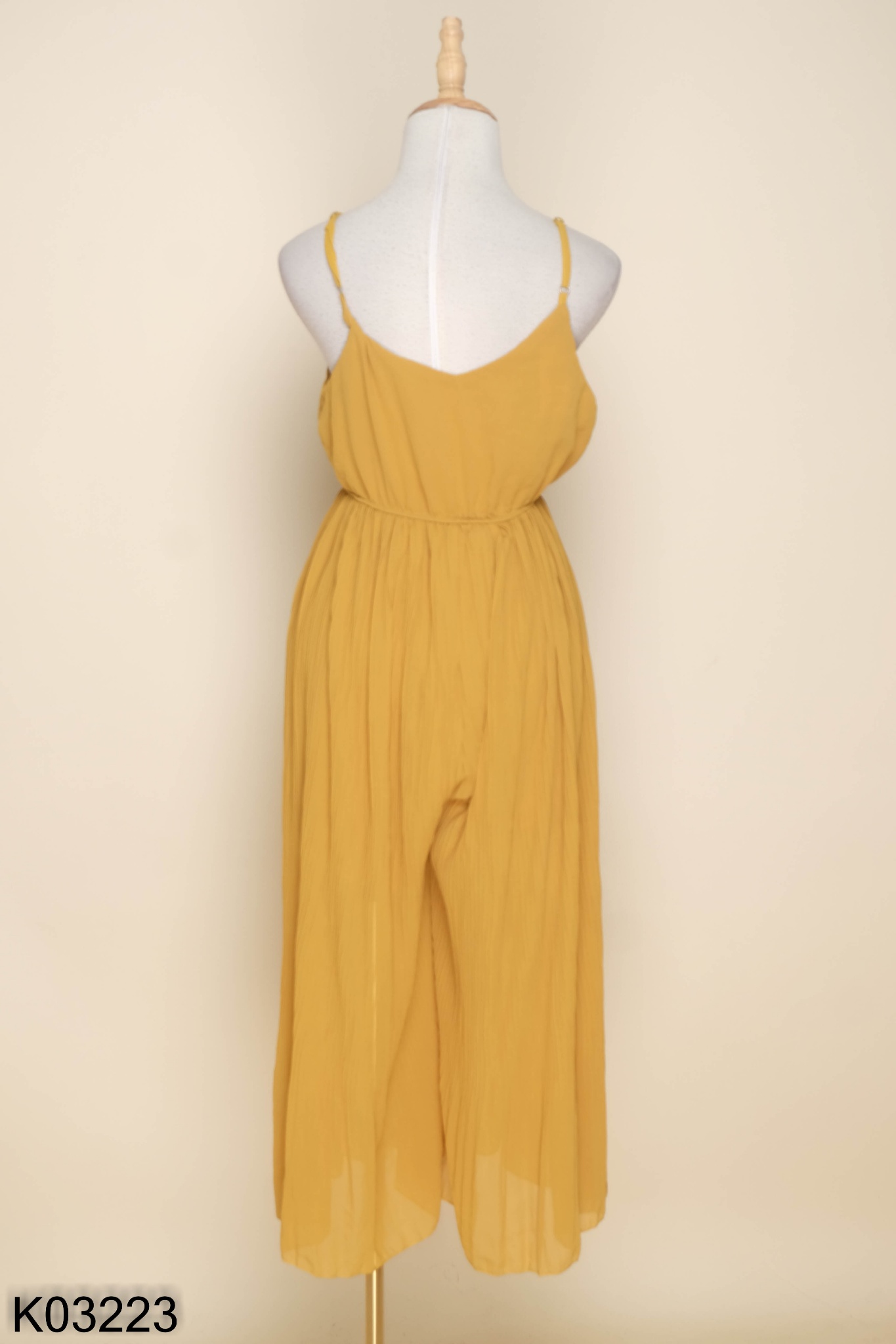 Jumpsuit vàng dập ly