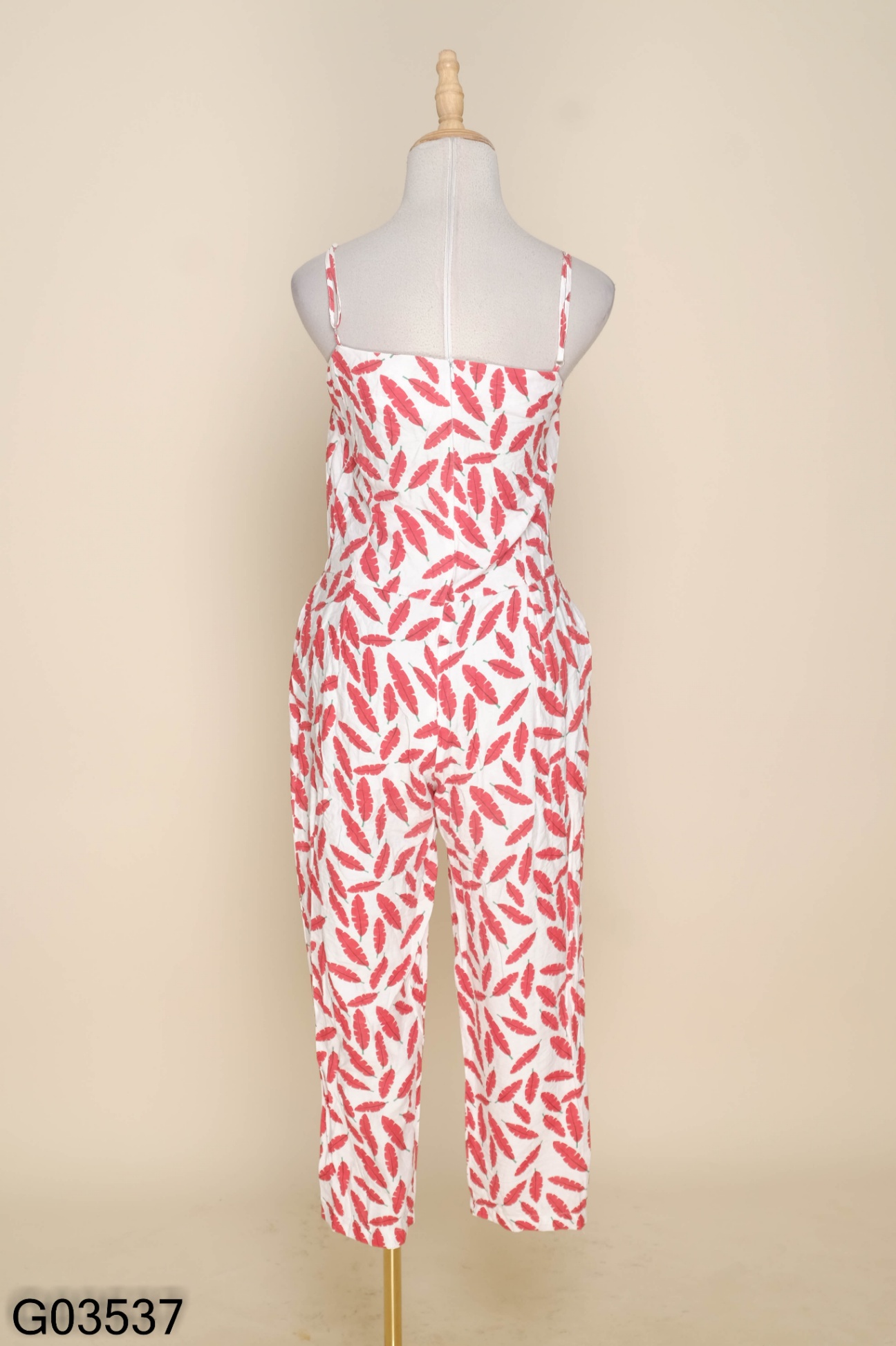 Jumpsuit trắng họa tiết đỏ