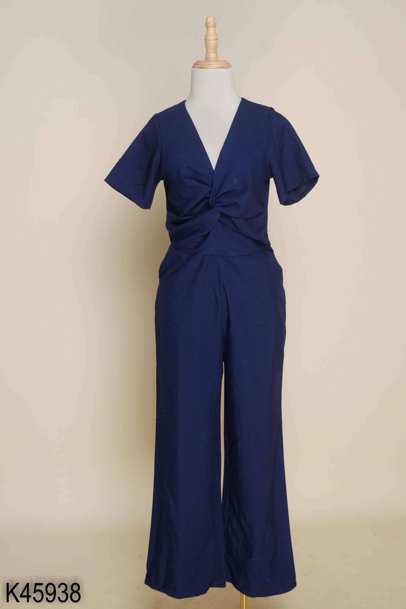 Jumpsuit xanh than dúm cổ V