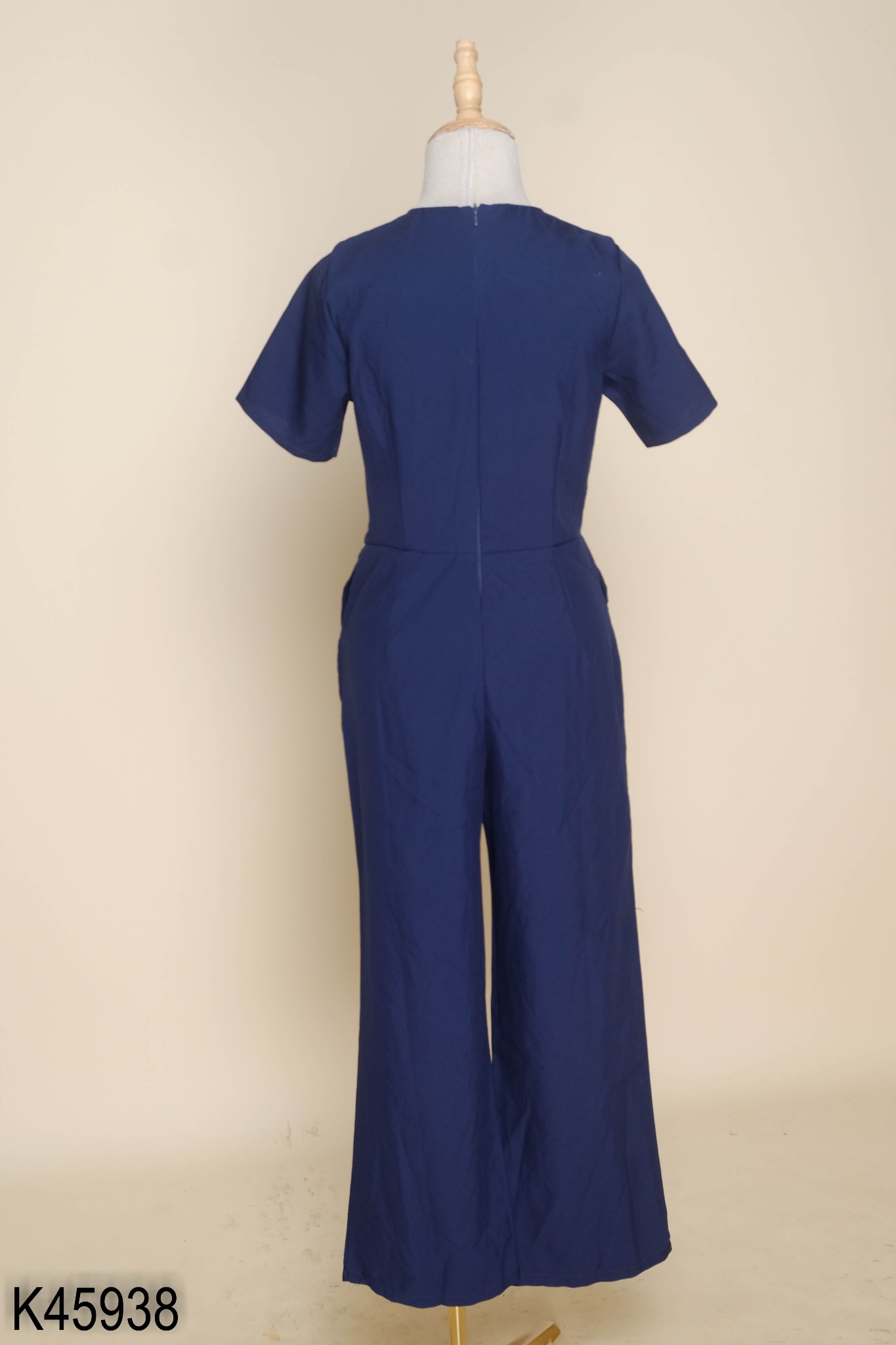 Jumpsuit xanh than dúm cổ V