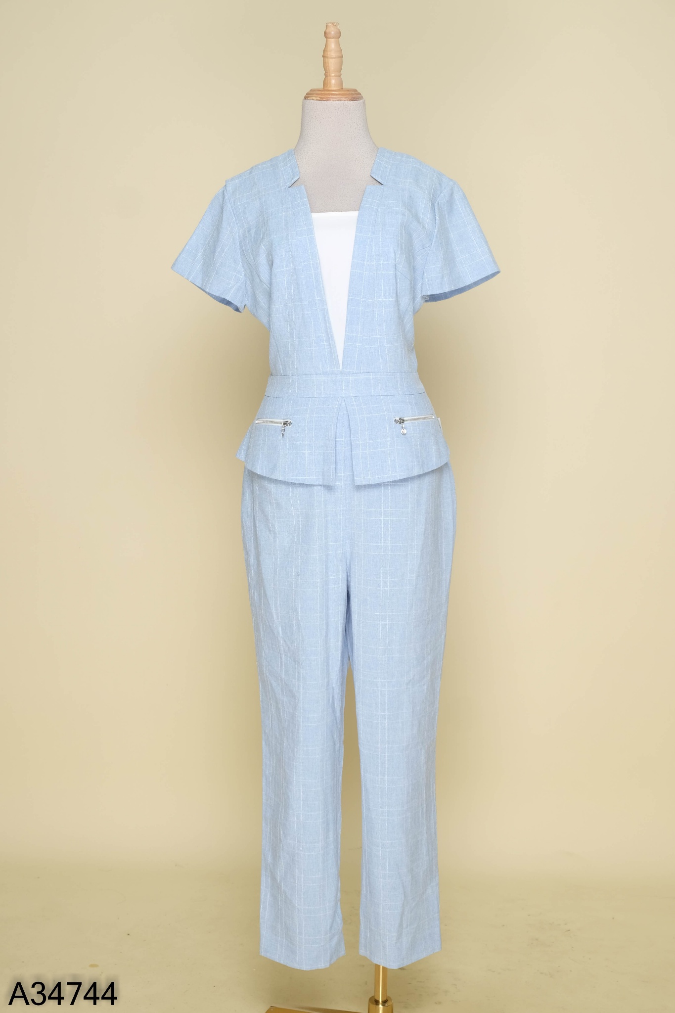 Jumpsuit EMSPO xanh kẻ trắng