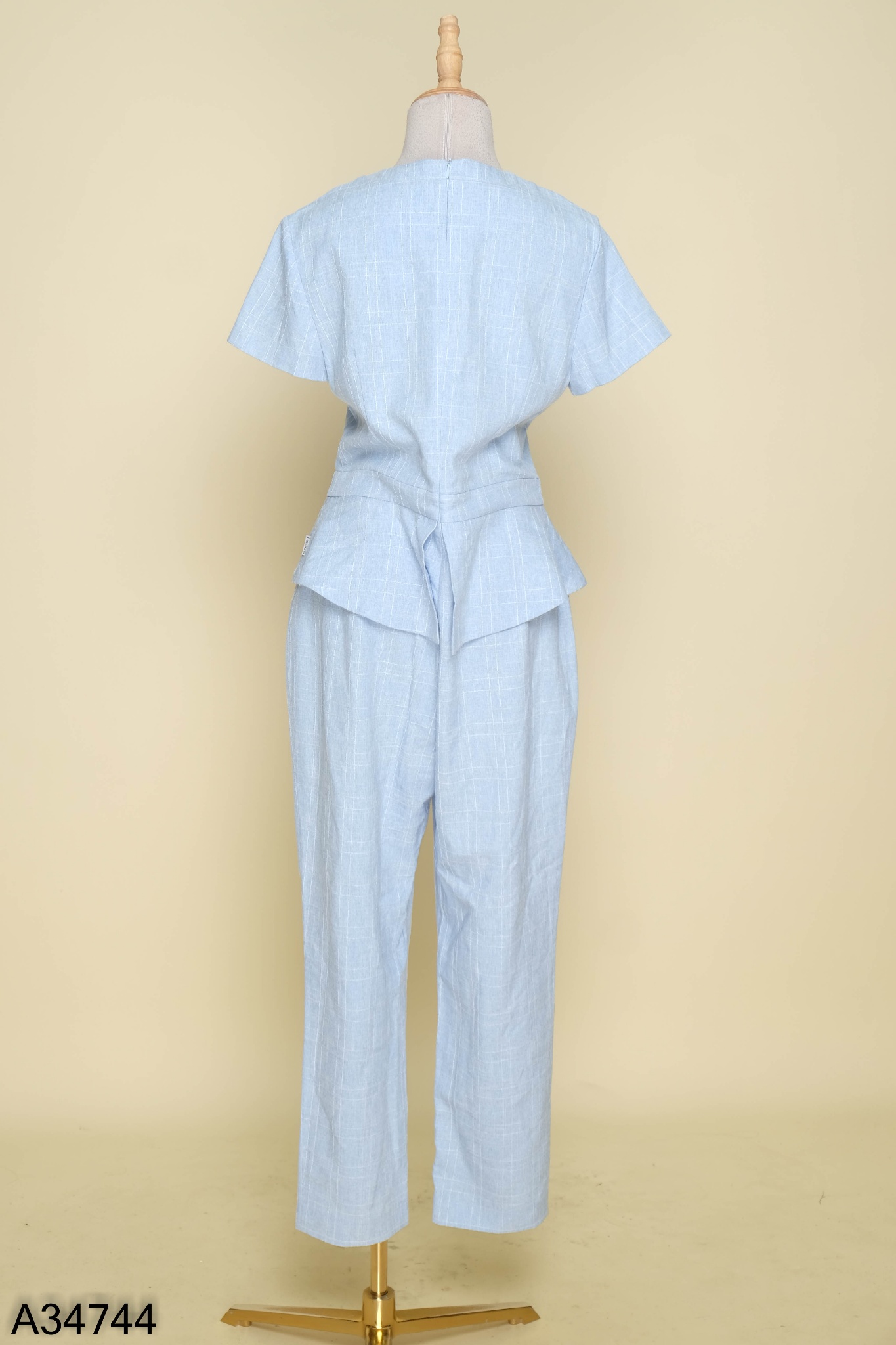 Jumpsuit EMSPO xanh kẻ trắng