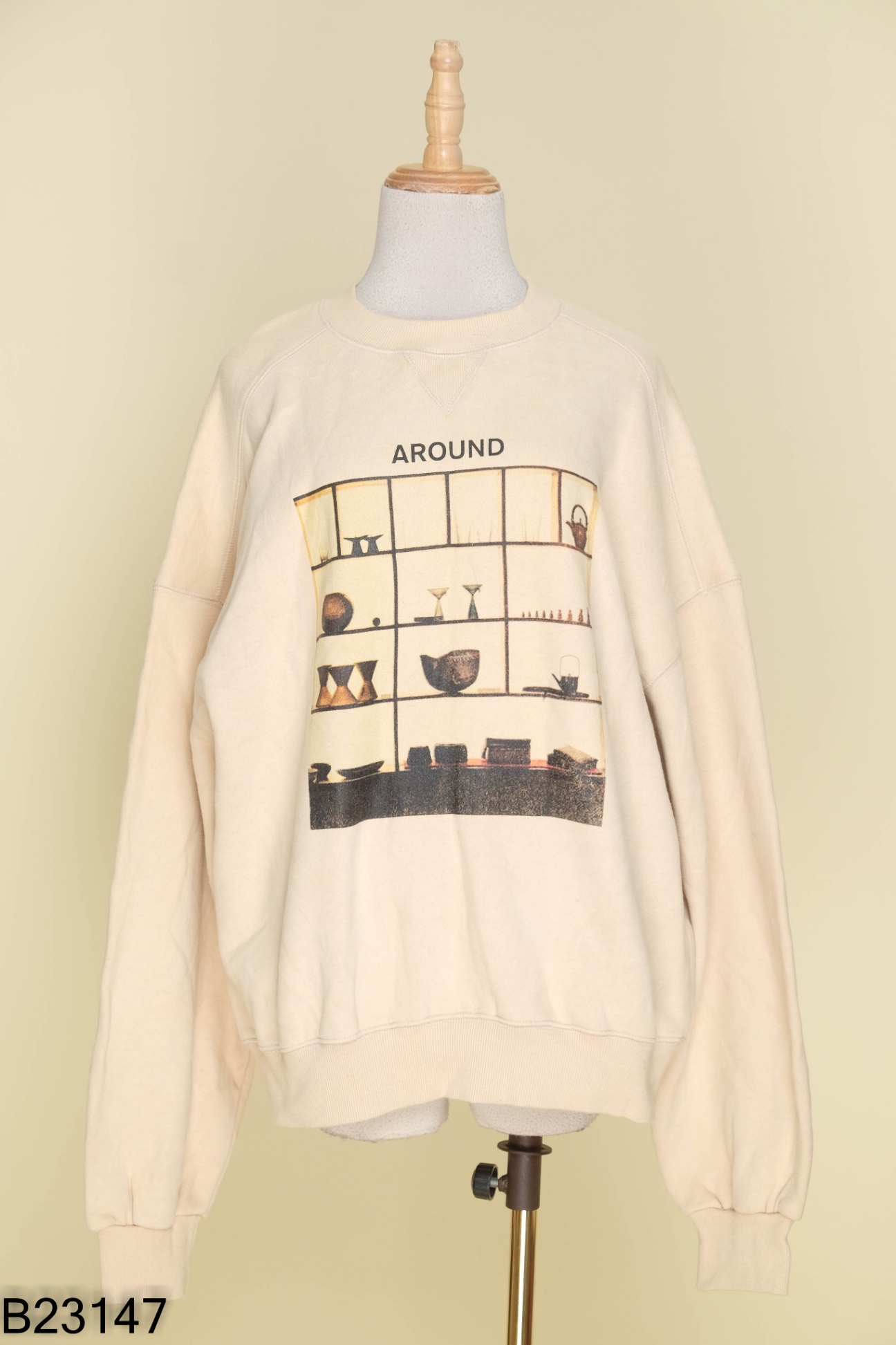 Áo sweater nỉ be hình