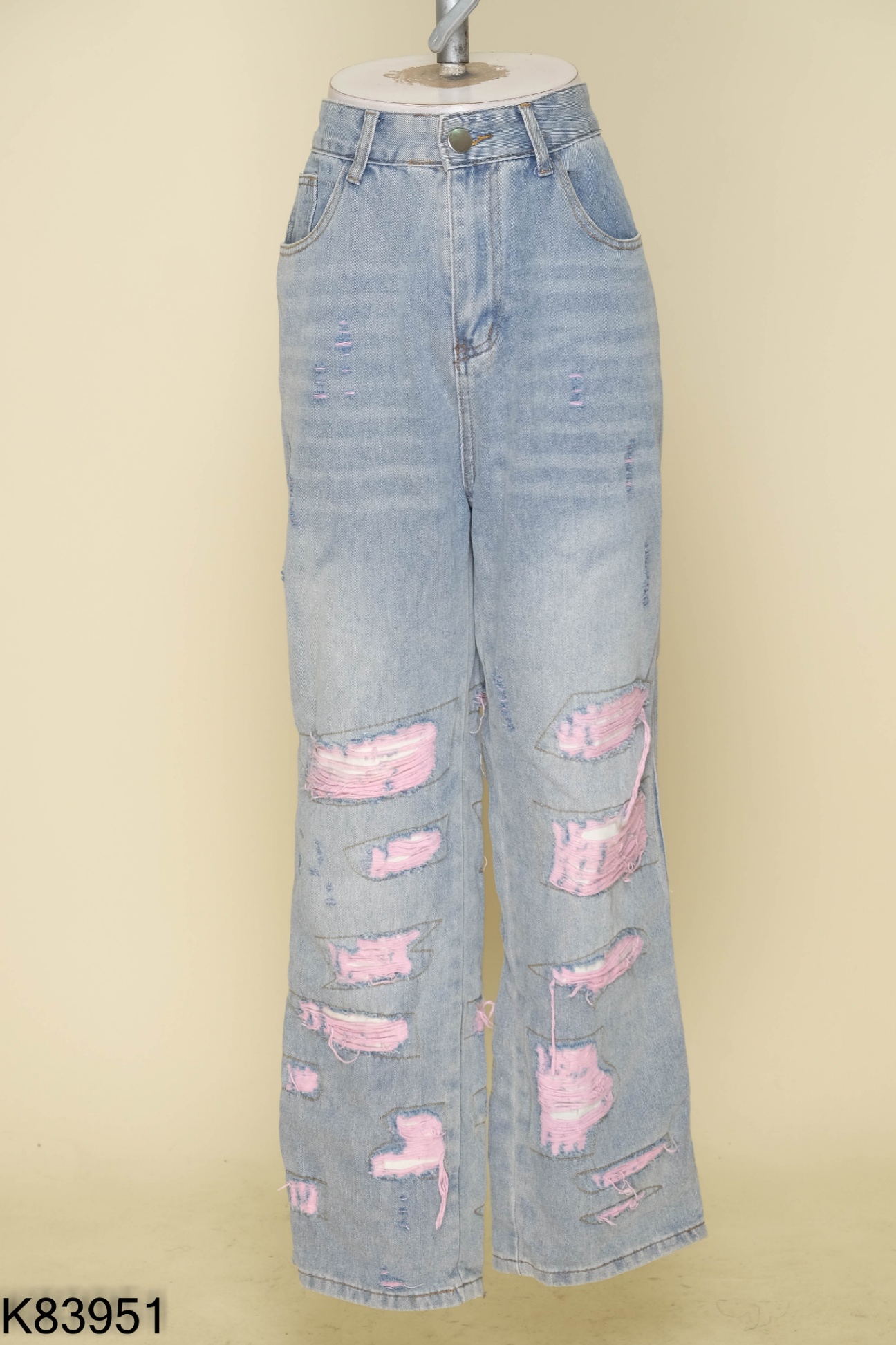 Quần jeans xanh rách hồng