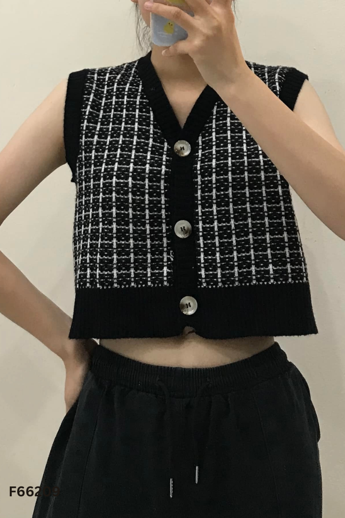 Áo len đen kẻ trắng