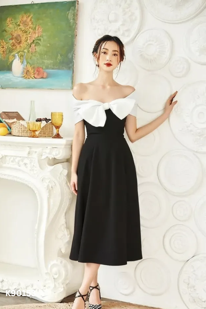 Váy đen phối be nơ