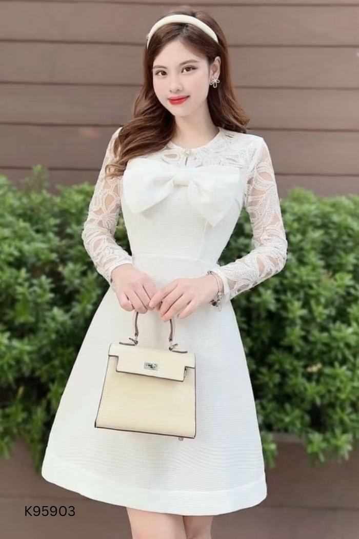 Váy trắng nơ phối ren