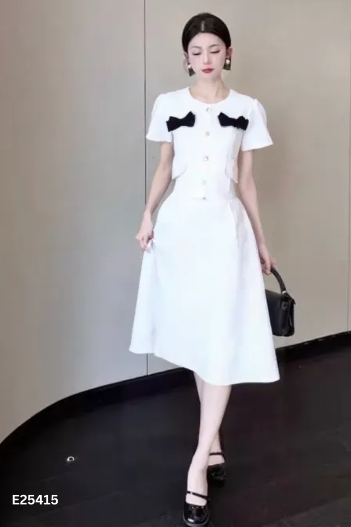 SET trắng nơ đen áo +chân váy