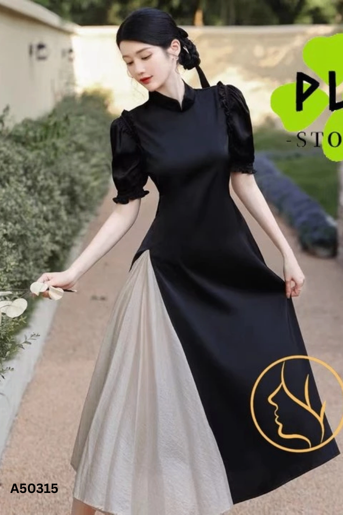 Váy đen phối vạt be