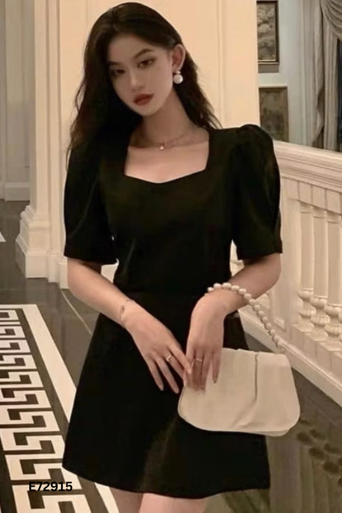 Váy đen buộc nơ be