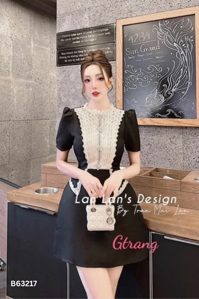 Váy nhung đen phối ren be
