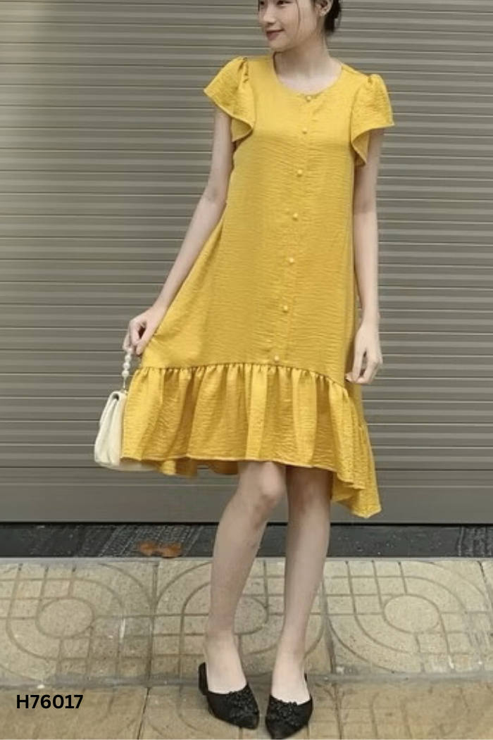 Váy lụa vàng cúc ngọc