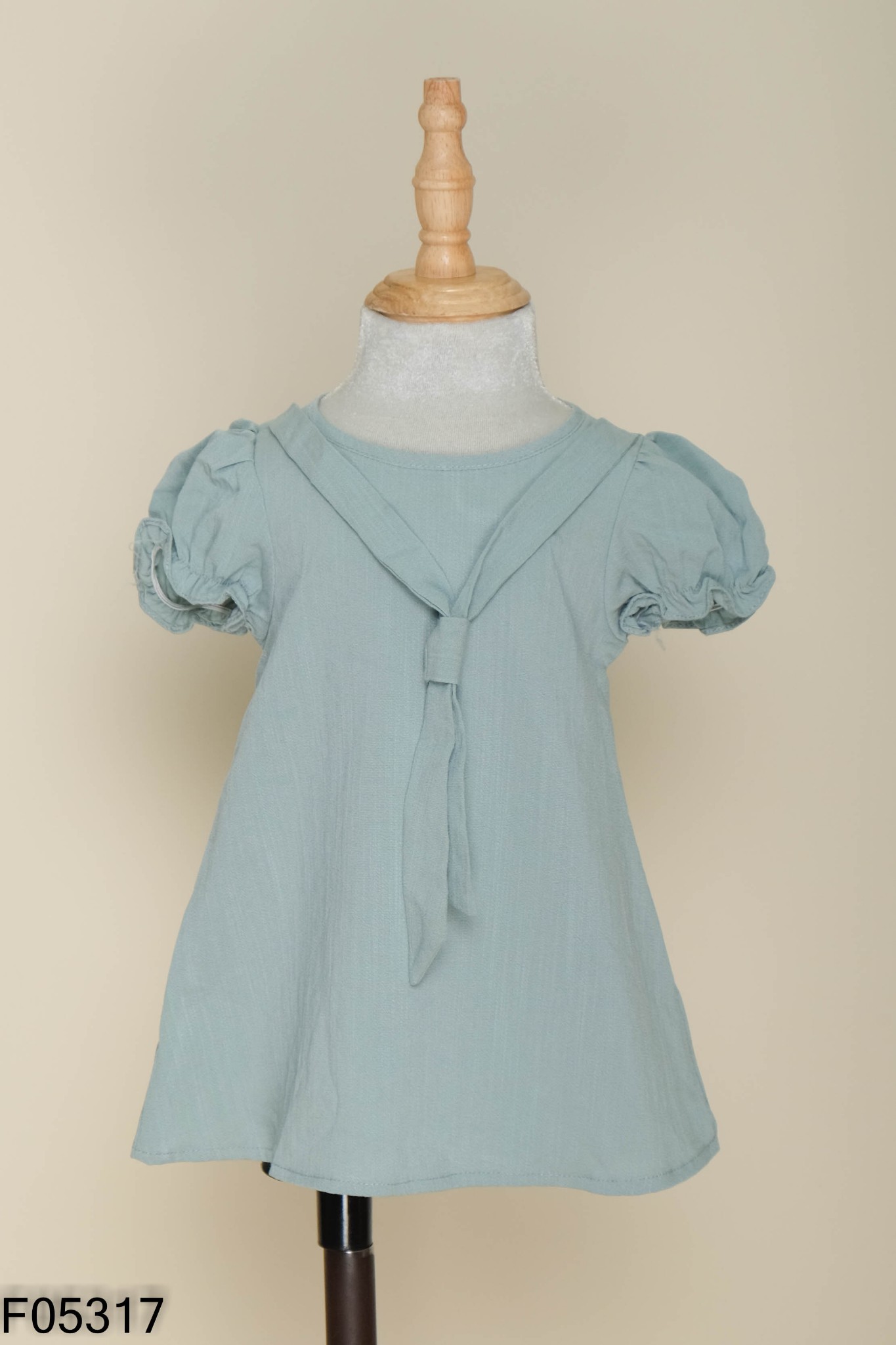 Áo xanh phối vạt KIDS