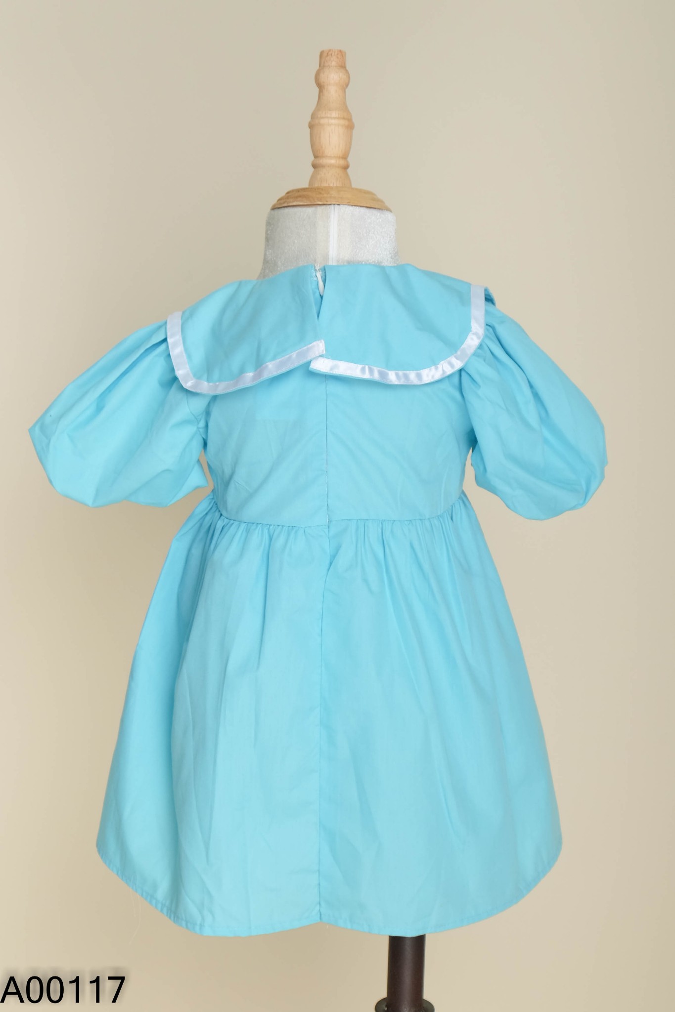 Váy xanh cổ nơ viền trắng KIDS