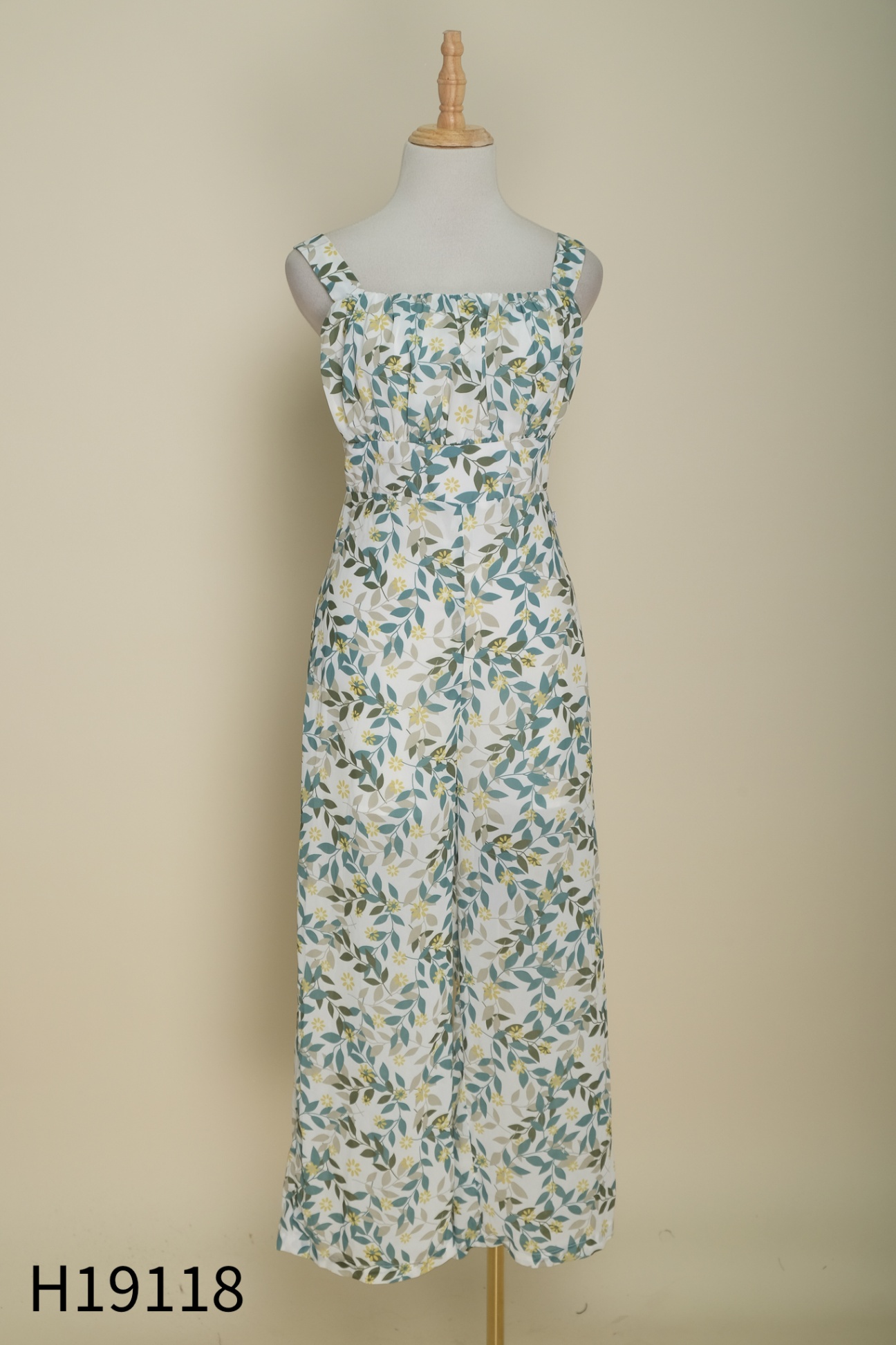 Jumpsuit GERME trắng họa tiết lá xanh