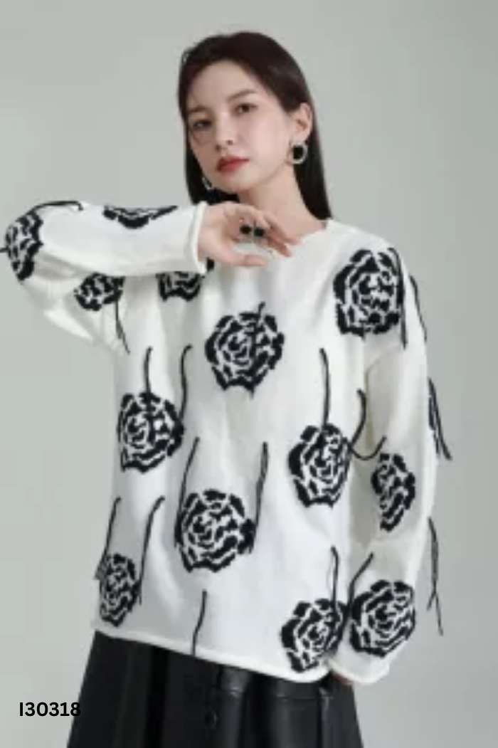 Áo len trắng hoa đen