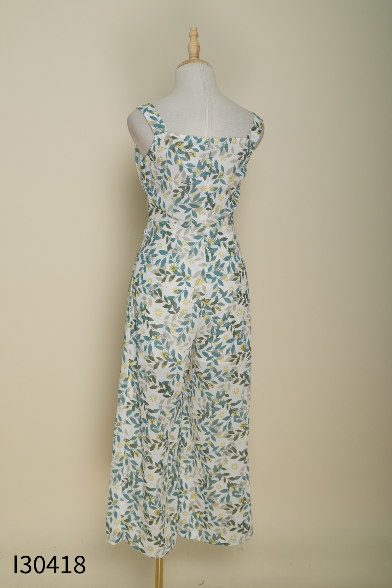 Jumpsuit GERME trắng họa tiết lá xanh