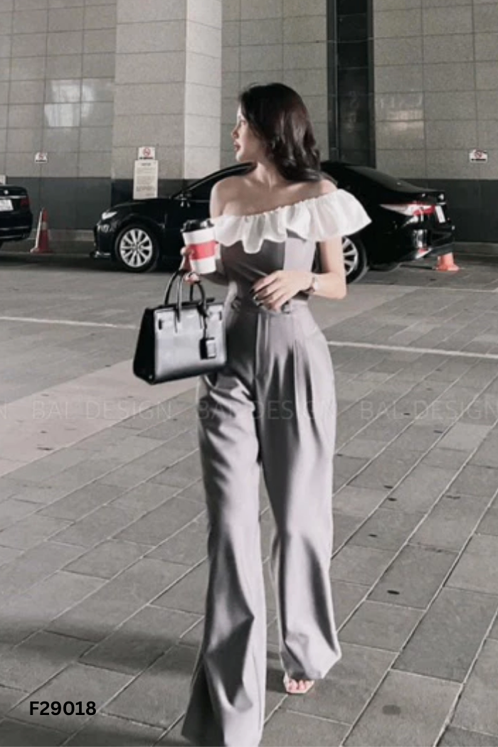 Jumpsuit xám phối trắng lệch vai