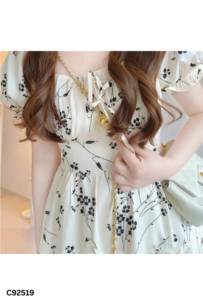 Váy be họa tiết đen
