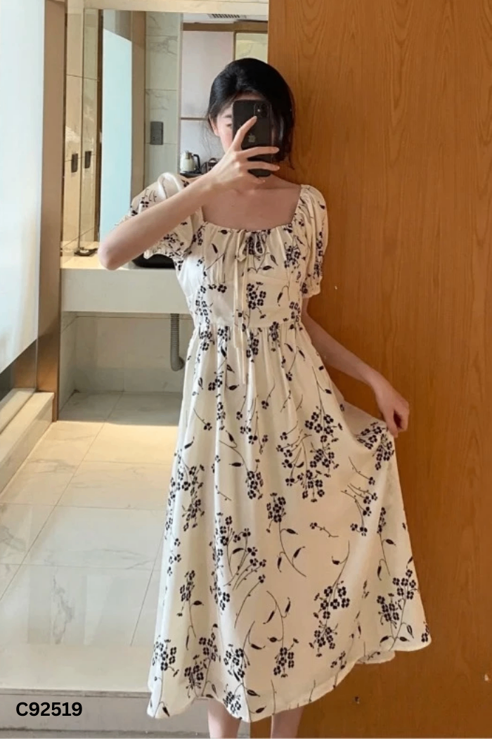 Váy be họa tiết đen