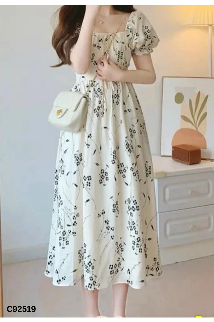 Váy be họa tiết đen