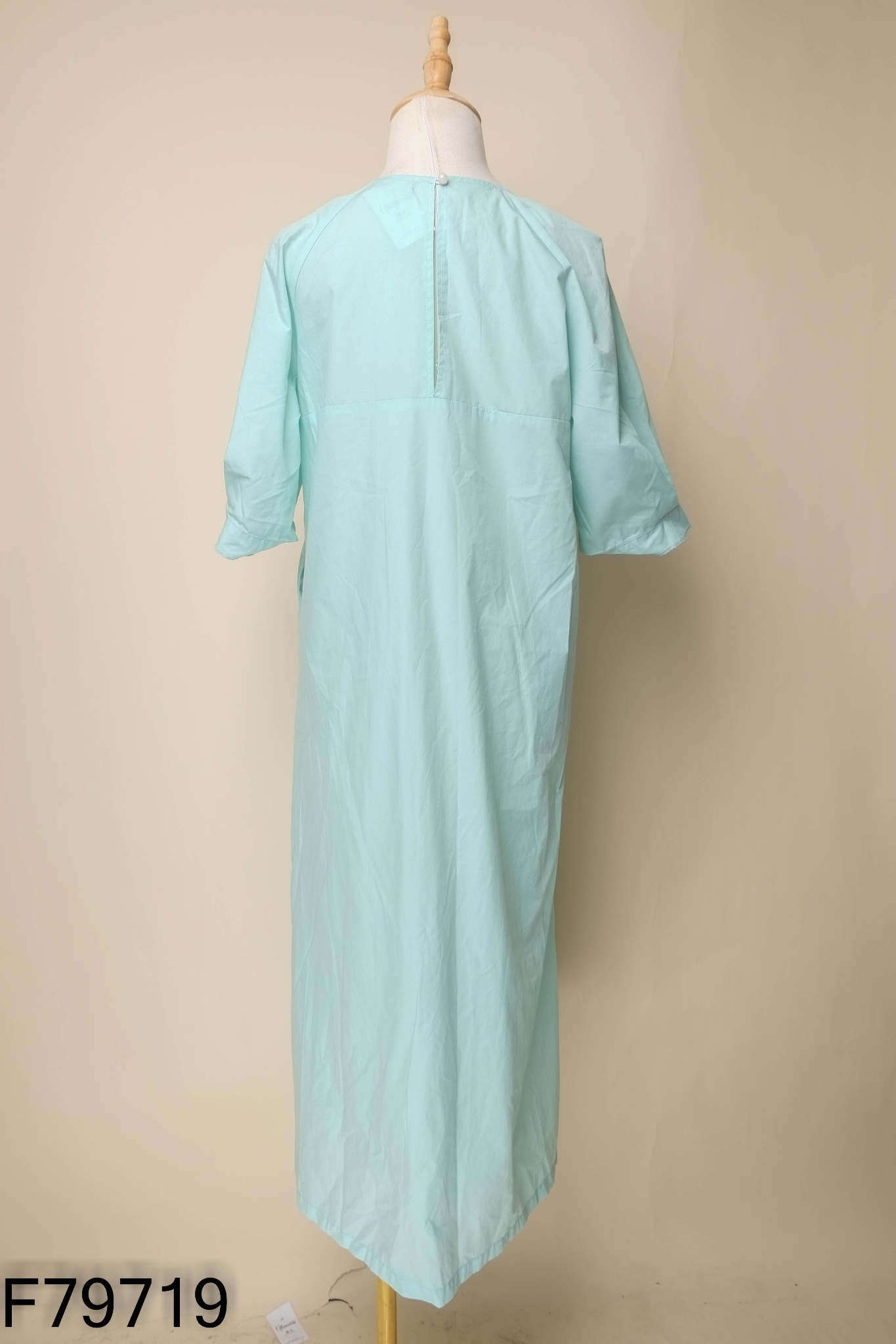 Váy xanh ngọc suông