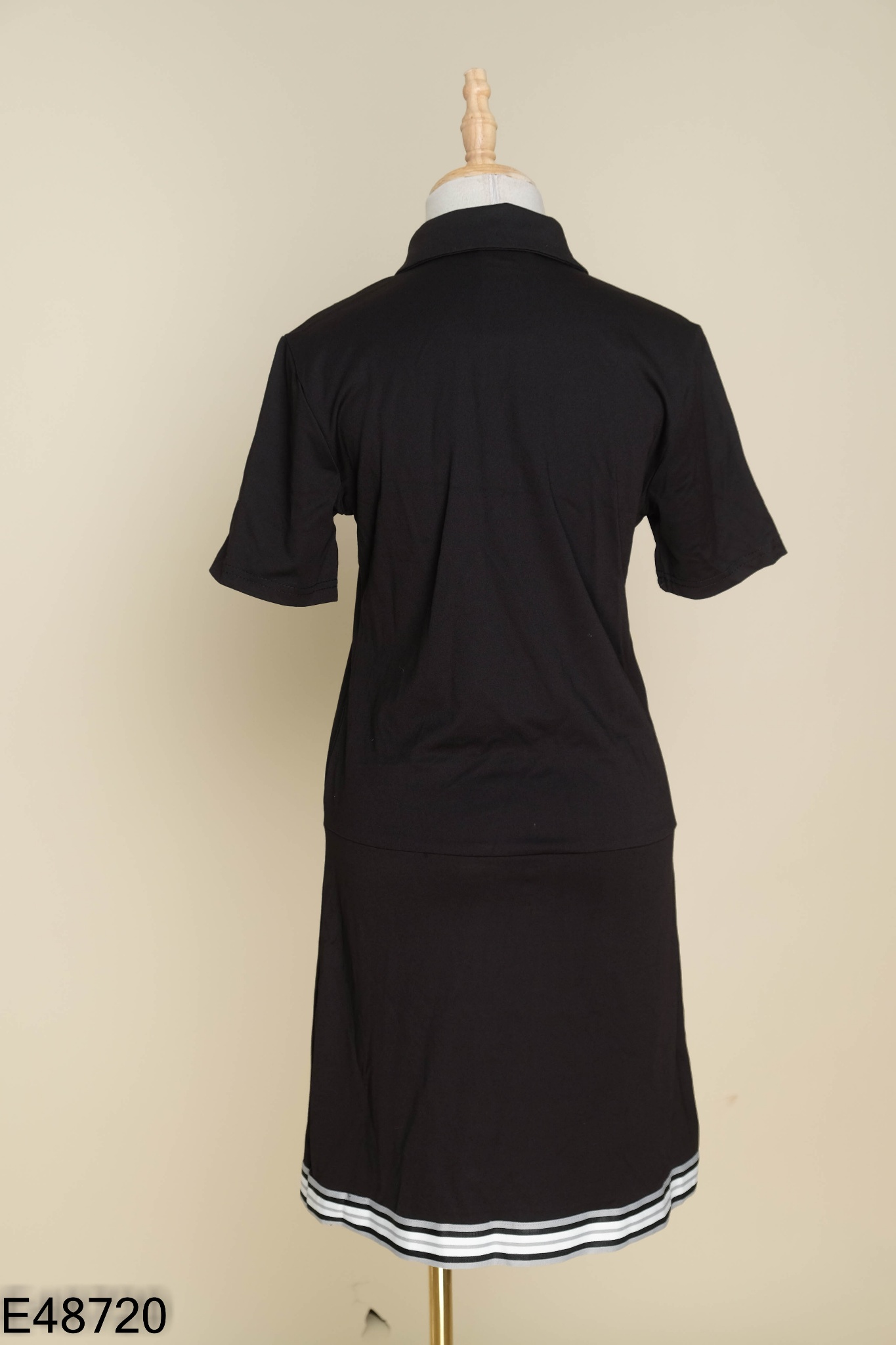 Váy polo đen đính hạt