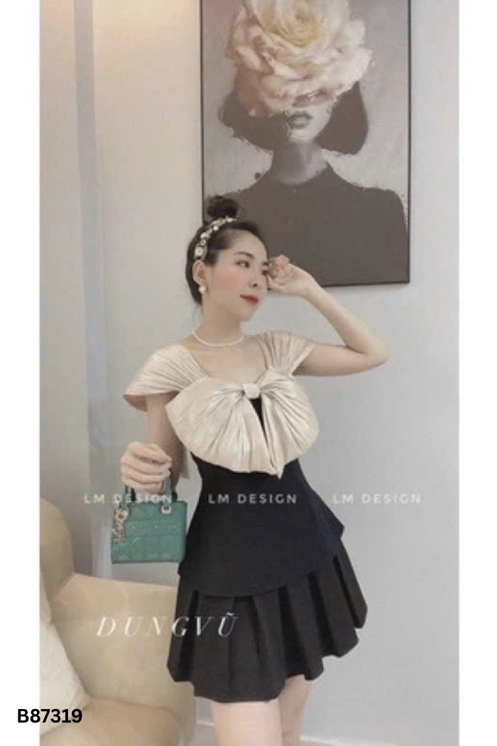 Áo đen phối nơ be