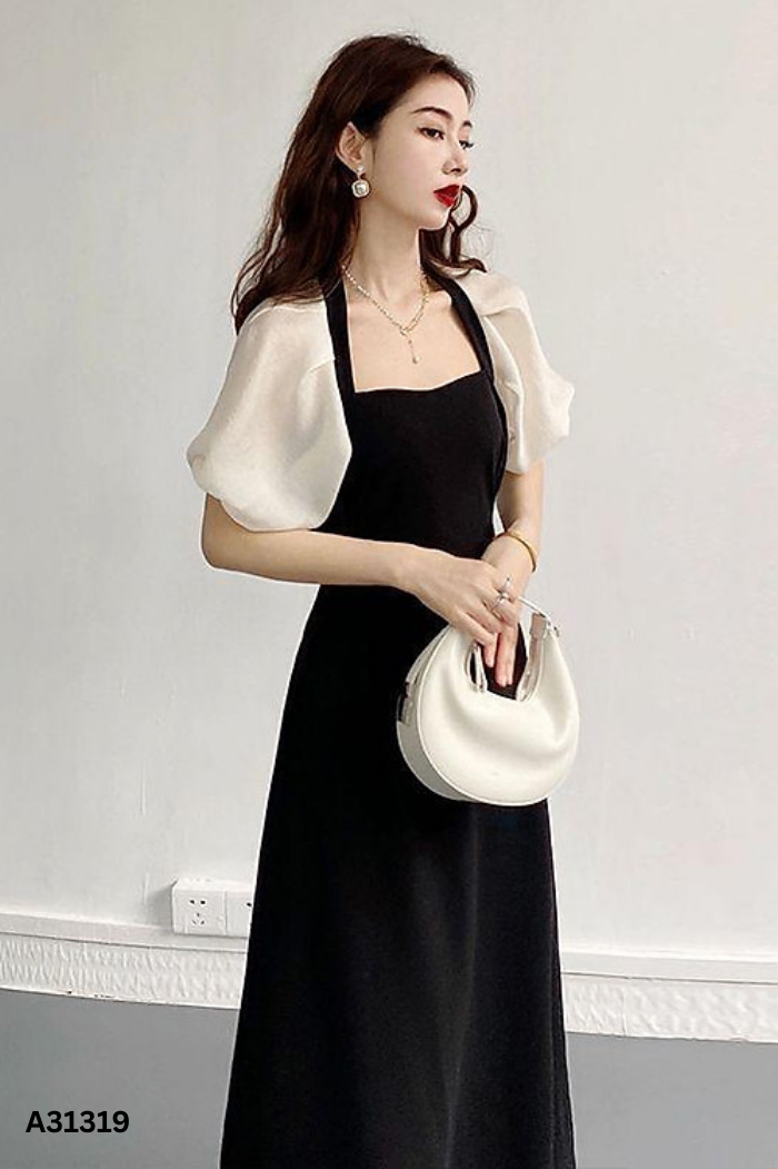 Váy đen phối tay be phồng