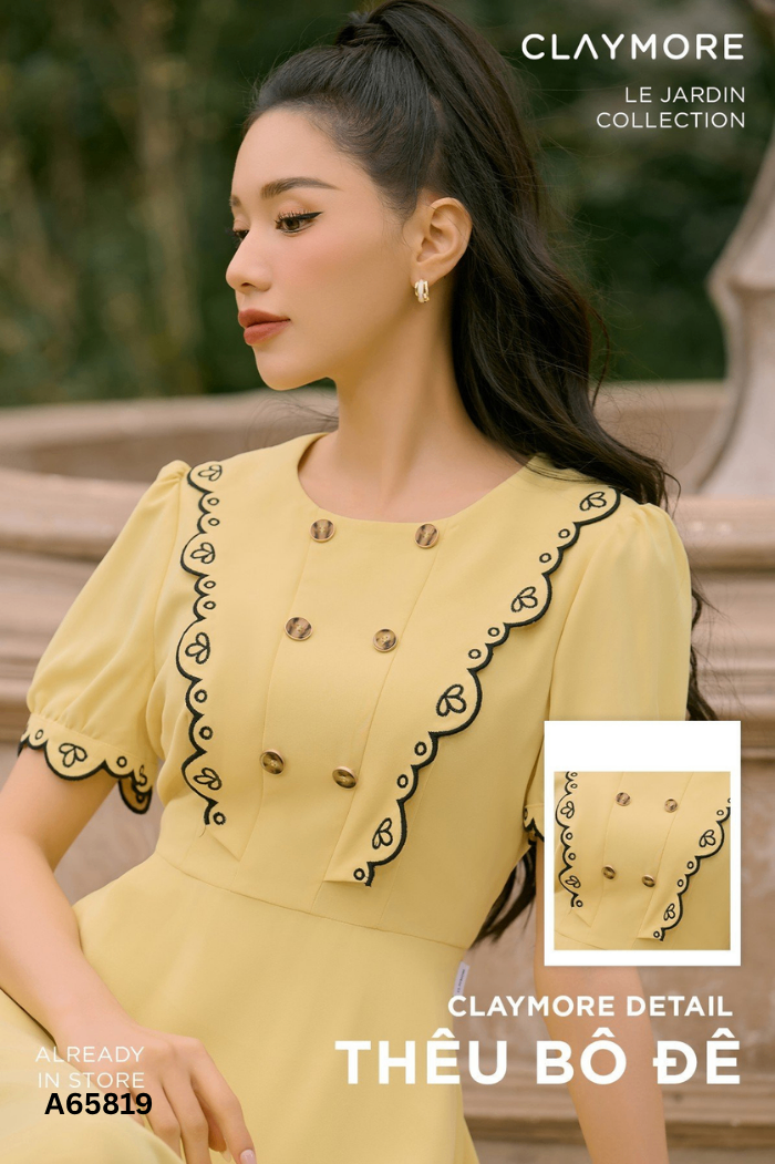 Váy vàng CLAYMORE phối cúc viền đen