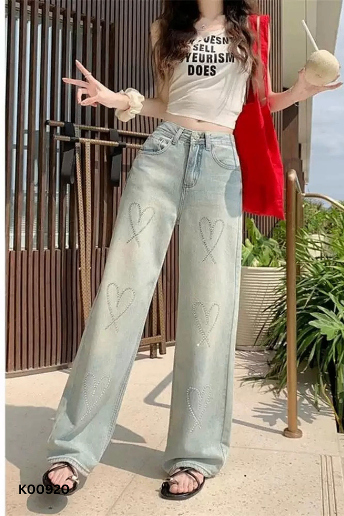 Quần jeans xanh đính đá